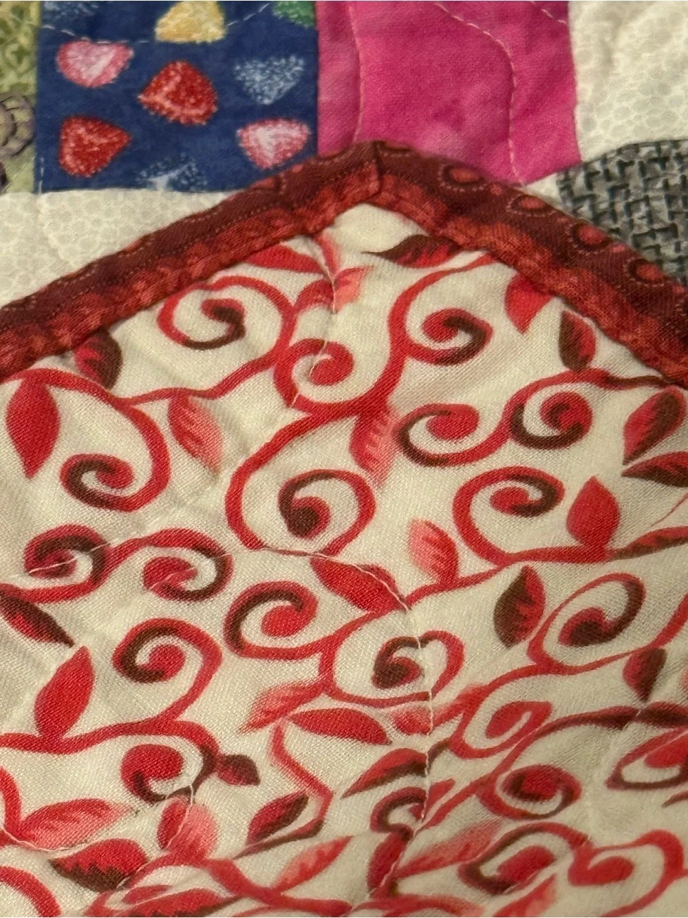 Vintage Multicolor Patchwork Quilt with Red Border